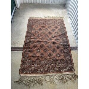 Antique Wool And Silk Rug With A Long Fringe